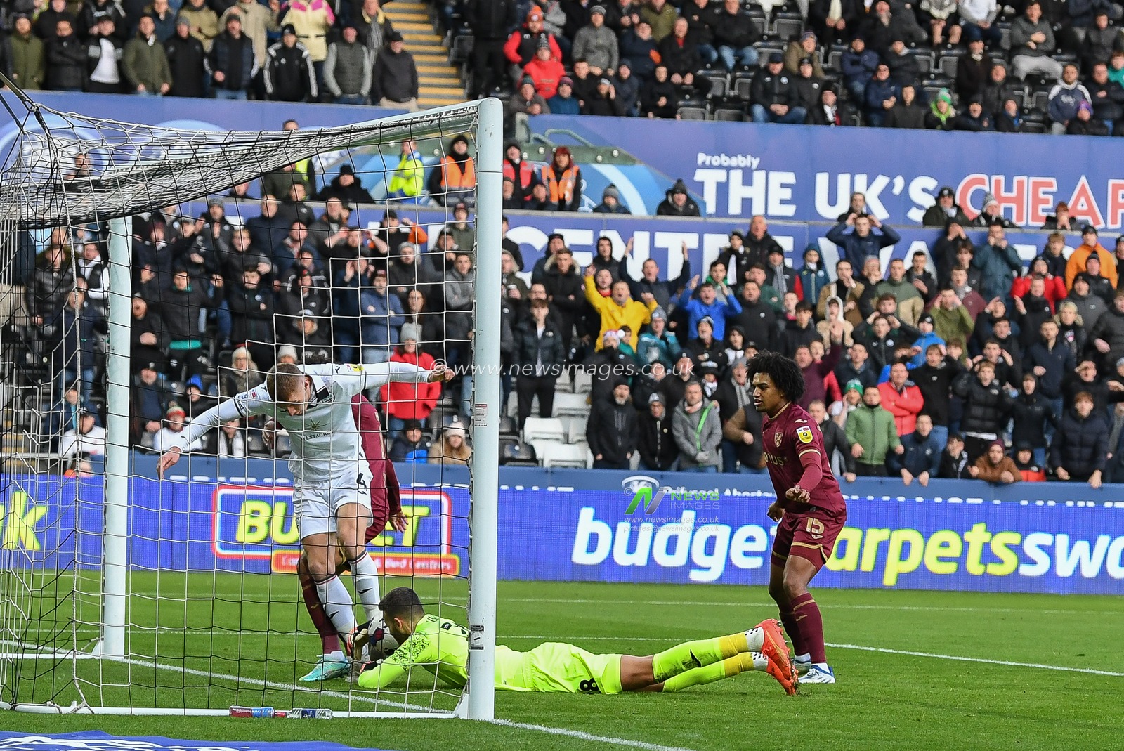 Angus Gunn #28 of Norwich City saves from Jay Fulton #4 of Swansea City during the Sky Bet Championship match Swansea City vs Norwich City at Swansea.com Stadium, Swansea, United Kingdom, 10th December 2022

(Photo by Mike Jones/News Images)