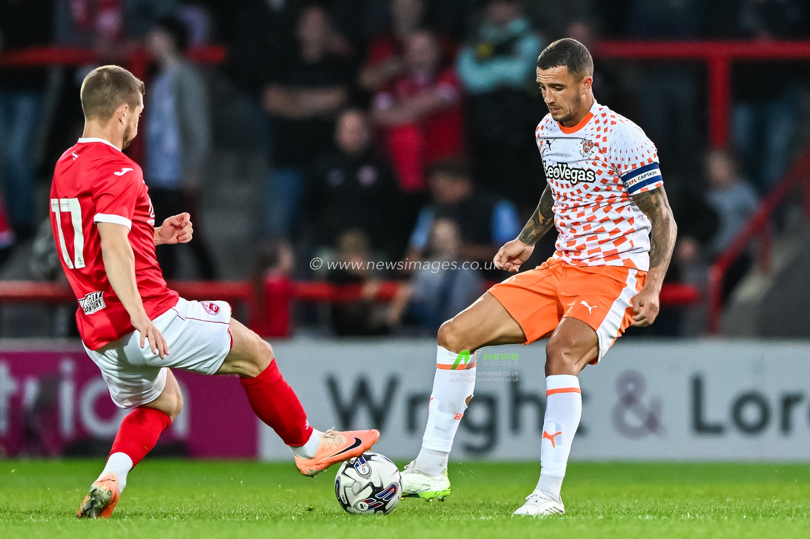 Oliver Norburn #6 of Blackpool battles for the ball during the Pre-season friendly match Morecambe vs Blackpool at Mazuma Stadium, Morecambe, United Kingdom, 25th July 2023

(Photo by Craig Thomas/News Images)
