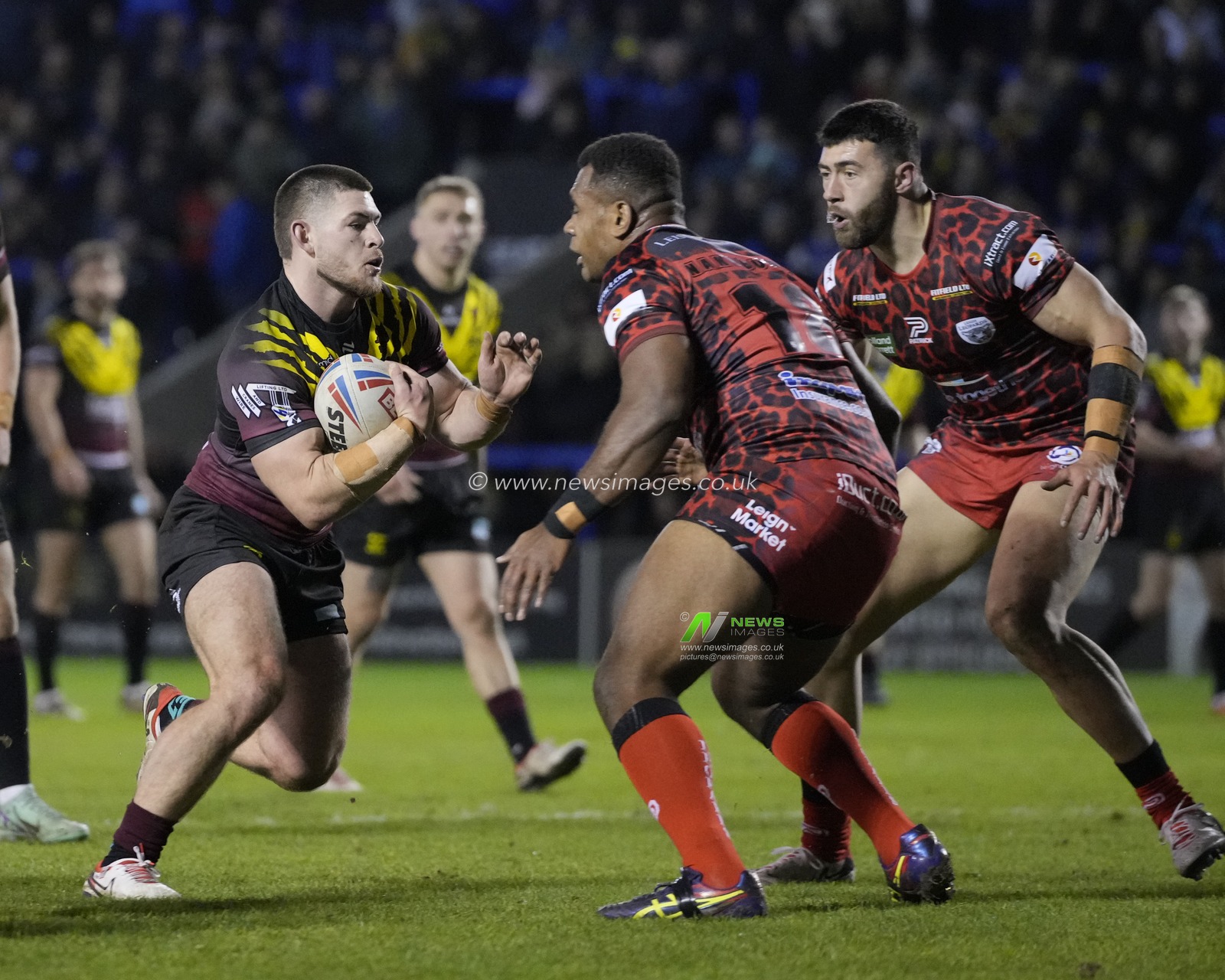 Danny Walker of Warrington Wolves runs at John Asiata of Leigh Leopards during the Rugby League Joe Philbin Testimonial match Warrington Wolves vs Leigh Leopards at Halliwell Jones Stadium, Warrington, United Kingdom, 3rd February 2024

(Photo by Steve Flynn/News Images)