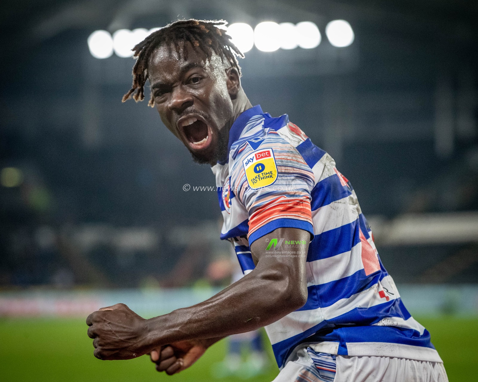 Amadou Mbengue #27 of Reading celebrates in front of the Hull City fans during the Sky Bet Championship match Hull City vs Reading at MKM Stadium, Hull, United Kingdom, 12th November 2022

(Photo by James Heaton/News Images)