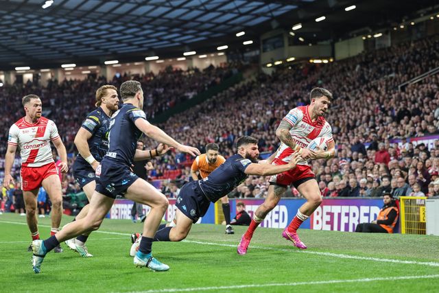 Oliver Gildart of Hull KR is pushed out by Abbas Miski of Wigan Warriors to stop him going over during the 2025 Betfred Super League Grand Final Hull KR v Wigan Warriors at Old Trafford, Manchester, United Kingdom, 11th October 2025

(Photo by Mark Cosgrove/News Images)
