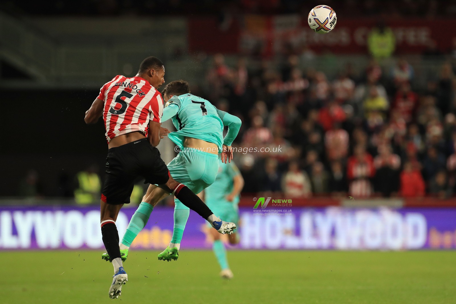 Ethan Pinnock #5 of Brentford and Solly March #7 of Brighton & Hove Albion compete for a header during the Premier League match Brentford vs Brighton and Hove Albion at Brentford Community Stadium, London, United Kingdom, 14th October 2022

(Photo by Carlton Myrie/News Images)