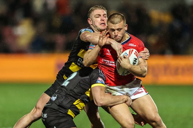 Mikey Lewis of Hull KR is tackled by Jesse Dee of York Knights and Liam Harris of York Knights during the Betfred Super League Round 1 match York Knights vs Hull KR at LNER Community Stadium, Lincoln, United Kingdom on 12 February 2026

(Photo by Alfie Cosgrove/News Images)