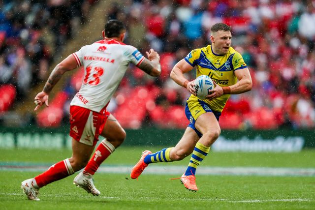 George Williams of Warrington Wolves runs with the ball during the Betfred Challenge Cup Final Warrington Wolves vs Hull KR at Wembley Stadium, London, United Kingdom, 7th June 2025

(Photo by Izzy Poles/News Images)