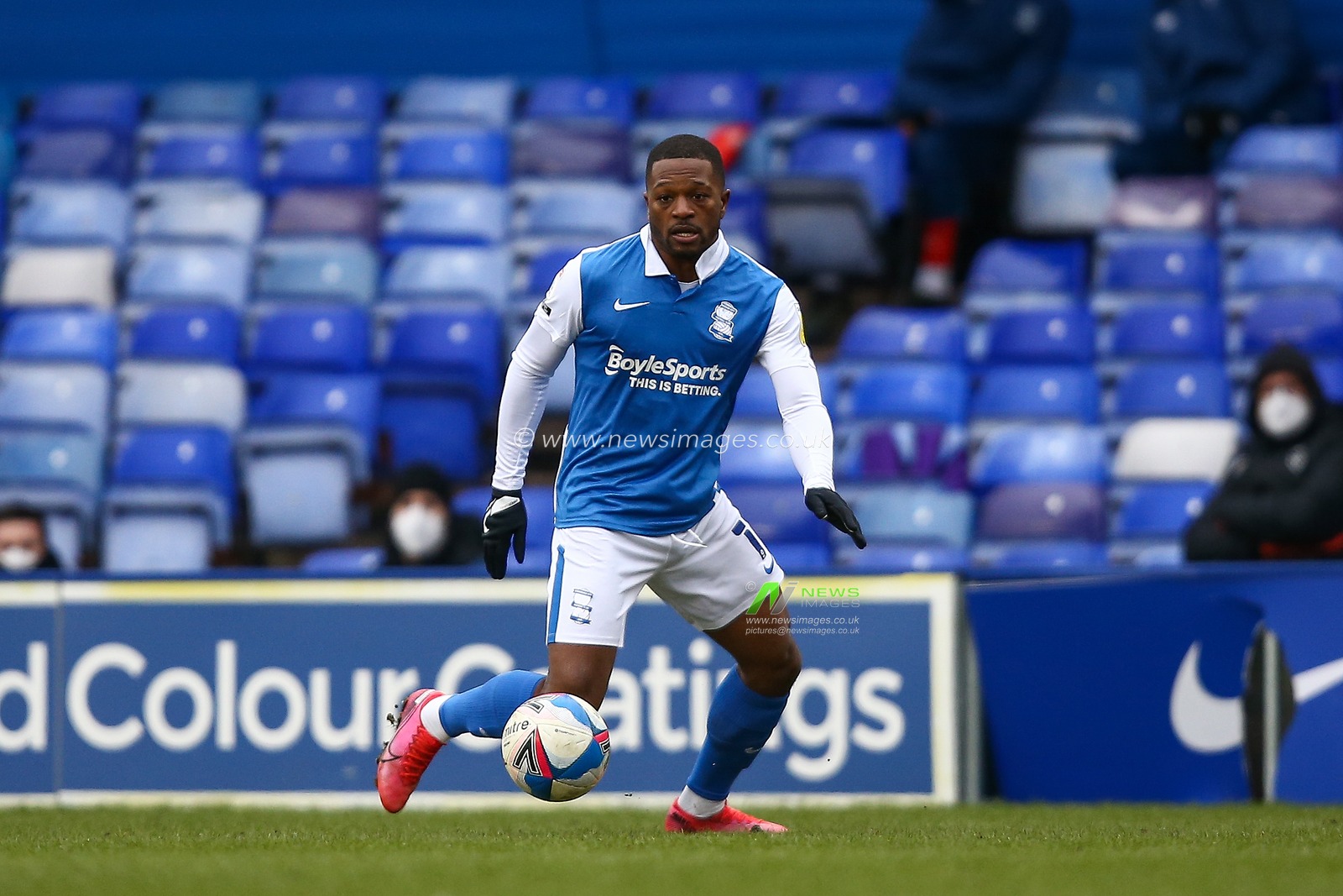 Jeremie Bela #11 of Birmingham City dribbles the ball