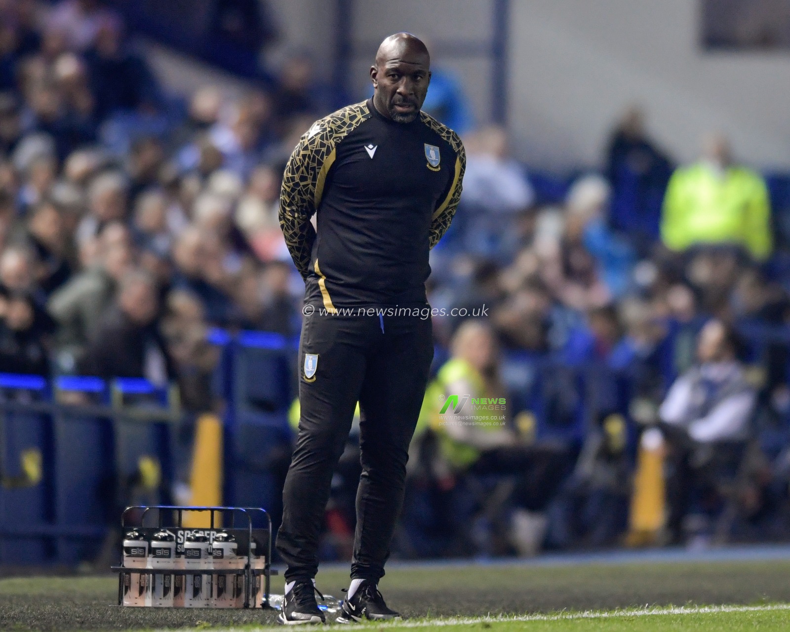 Darren Moore manager of Sheffield Wednesday watches the game from the sidelines