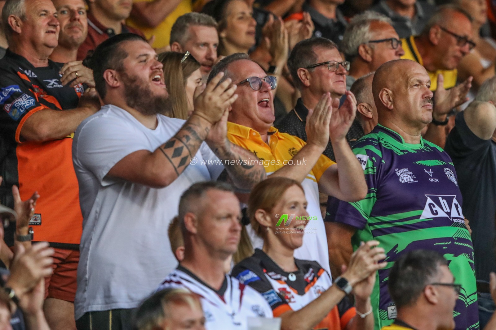 Castleford fans celebrate a try from Fletcher Rooney of Castleford Tigers during the Betfred Super League Round 20 match Castleford Tigers vs Leigh Leopards at The Mend-A-Hose Jungle, Castleford, United Kingdom, 1st August 2024

(Photo by Alfie Cosgrove/News Images)