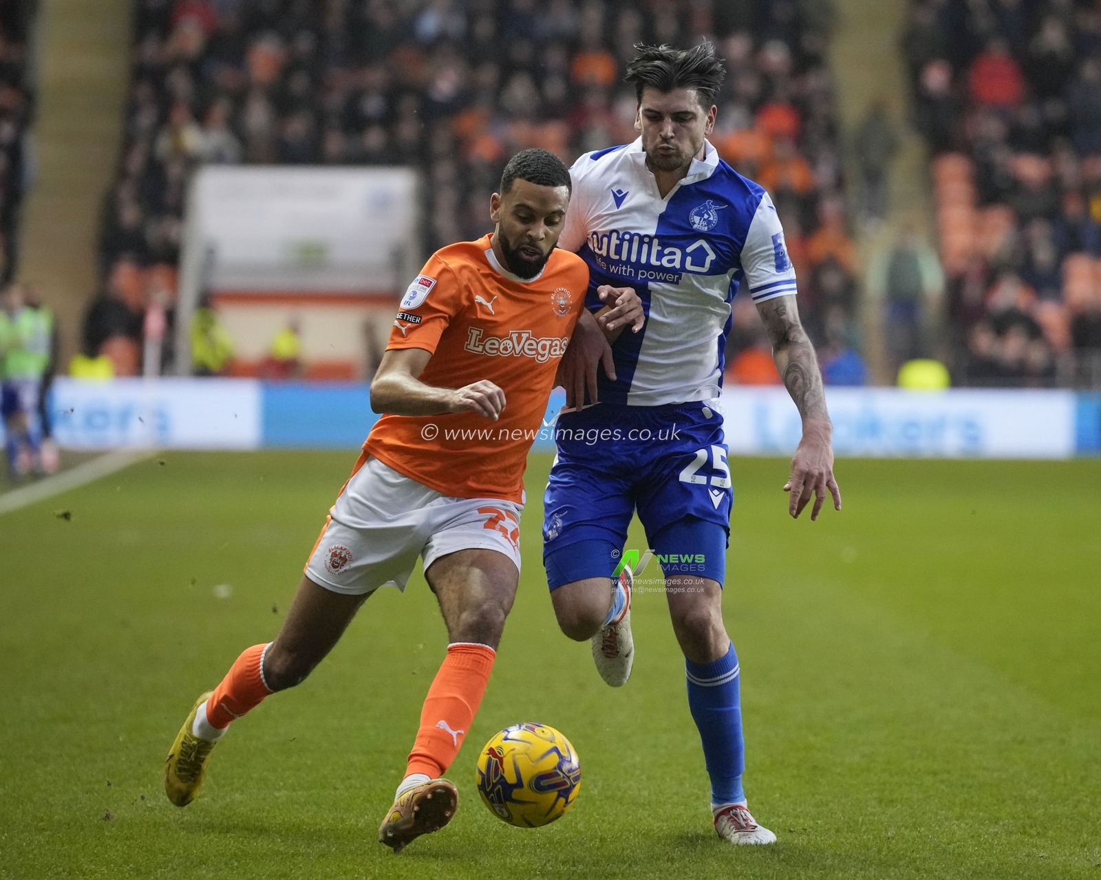 CJ Hamilton #22 of Blackpool cheese a ball with Tristan Crama #25 of Bristol Rovers during the Sky Bet League 1 match Blackpool vs Bristol Rovers at Bloomfield Road, Blackpool, United Kingdom, 23rd December 2023

(Photo by Steve Flynn/News Images)