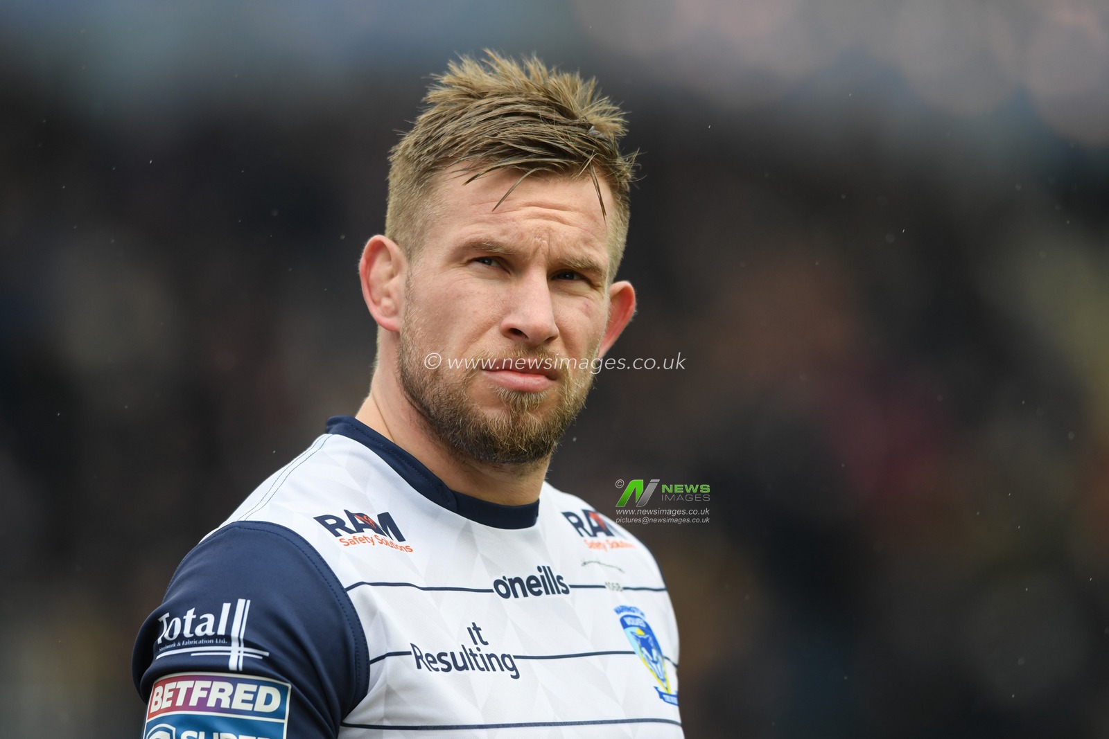 Mike Cooper #10 of Warrington Wolves in action during the game