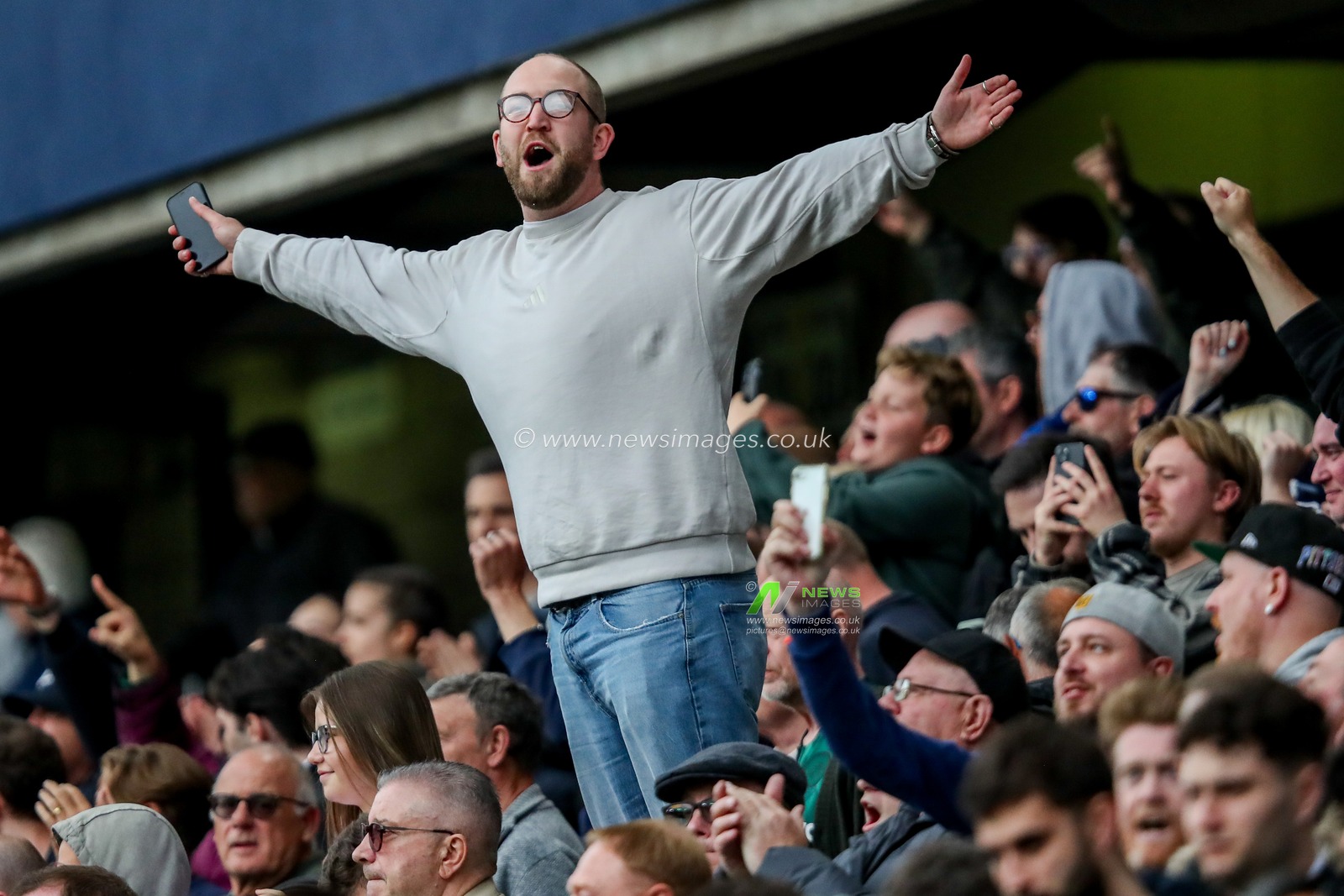 A Millwall fans celebrates after the teams victory following the Sky Bet Championship match Millwall vs Norwich City at The Den, London, United Kingdom, 21st April 2025

(Photo by Izzy Poles/News Images)