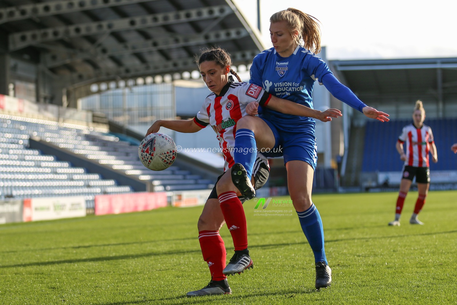 Rhema Lord-Mears #12 of Sheffield United and Emily Roberts #17 of Durham contest for the ball