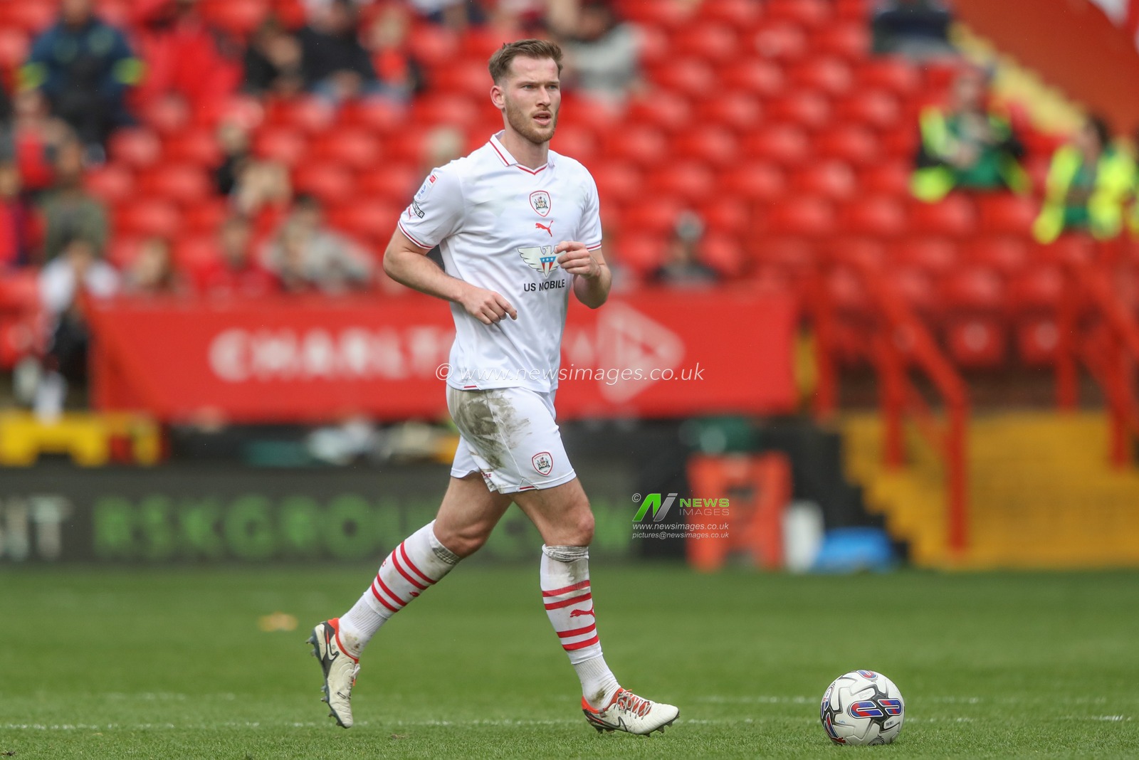 Jamie McCart of Barnsley breaks with the ball during the Sky Bet League 1 match Charlton Athletic vs Barnsley at The Valley, London, United Kingdom, 6th April 2024

(Photo by Alfie Cosgrove/News Images)