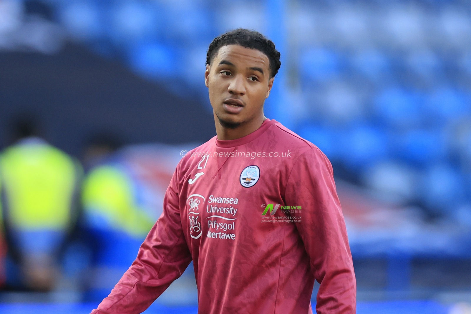 Armstrong Okoflex #21 of Swansea City during the warm up ahead of the Sky Bet Championship match Huddersfield Town vs Swansea City at John Smith's Stadium, Huddersfield, United Kingdom, 12th November 2022

(Photo by Conor Molloy/News Images)