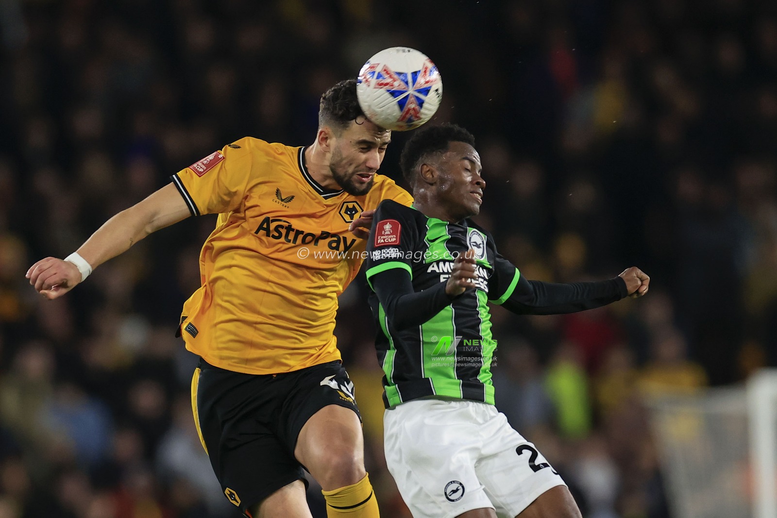 Max Kilman of Wolverhampton Wanderers wins the header against Simon Adingra of Brighton & Hove Albion during the Emirates FA Cup 5th Round match Wolverhampton Wanderers vs Brighton and Hove Albion at Molineux, Wolverhampton, United Kingdom, 28th February 2024

(Photo by Conor Molloy/News Images)