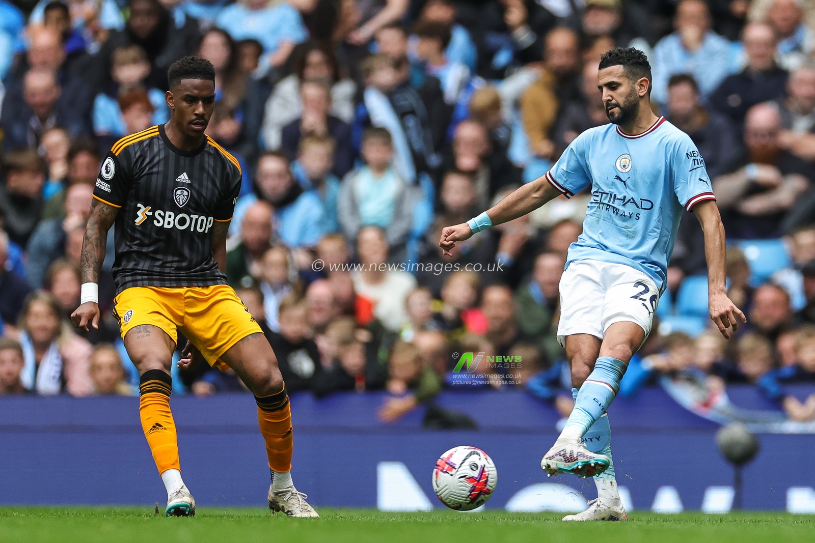 Riyad Mahrez #26 of Manchester City passes the ball during the Premier League match Manchester City vs Leeds United at Etihad Stadium, Manchester, United Kingdom, 6th May 2023

(Photo by Mark Cosgrove/News Images)