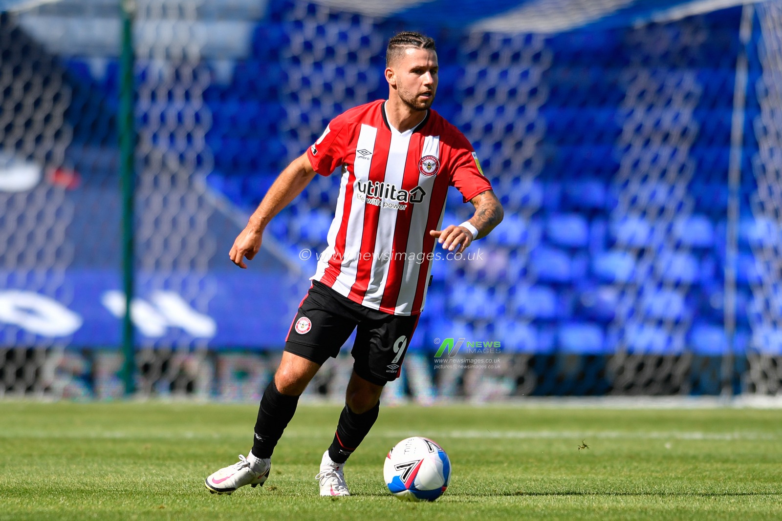 Emiliano Marcondes (9) of Brentford in action during the game