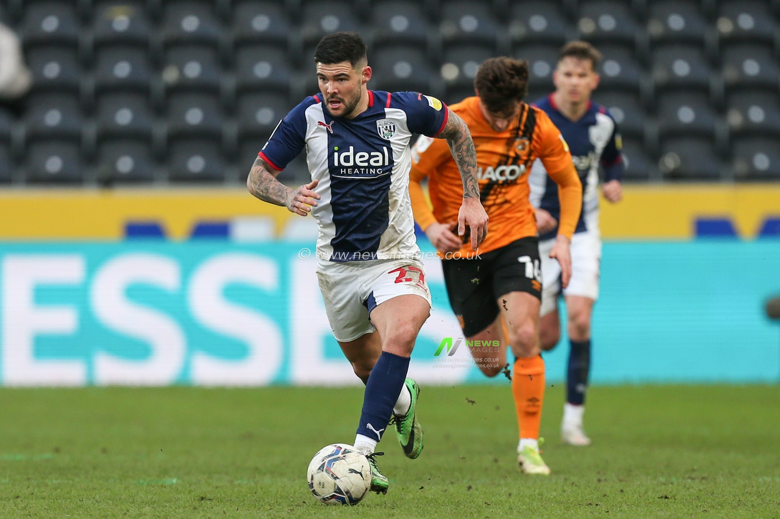 Alex Mowatt #27 of West Bromwich Albion moves up the pitch with the ball