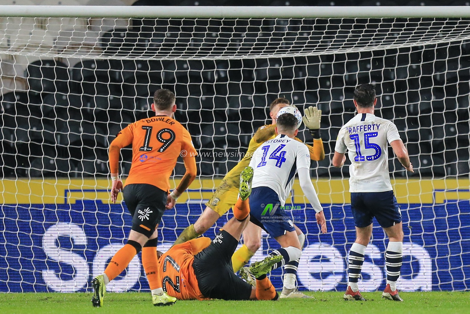 27th November 2019, KC Stadium, Kingston upon Hull, England; Sky Bet Championship, Hull City v Preston North End : Josh Magennis (27) of Hull City sees his shot saved by  Declan Rudd (1) of Preston North End  

Credit: David Greaves/News Images