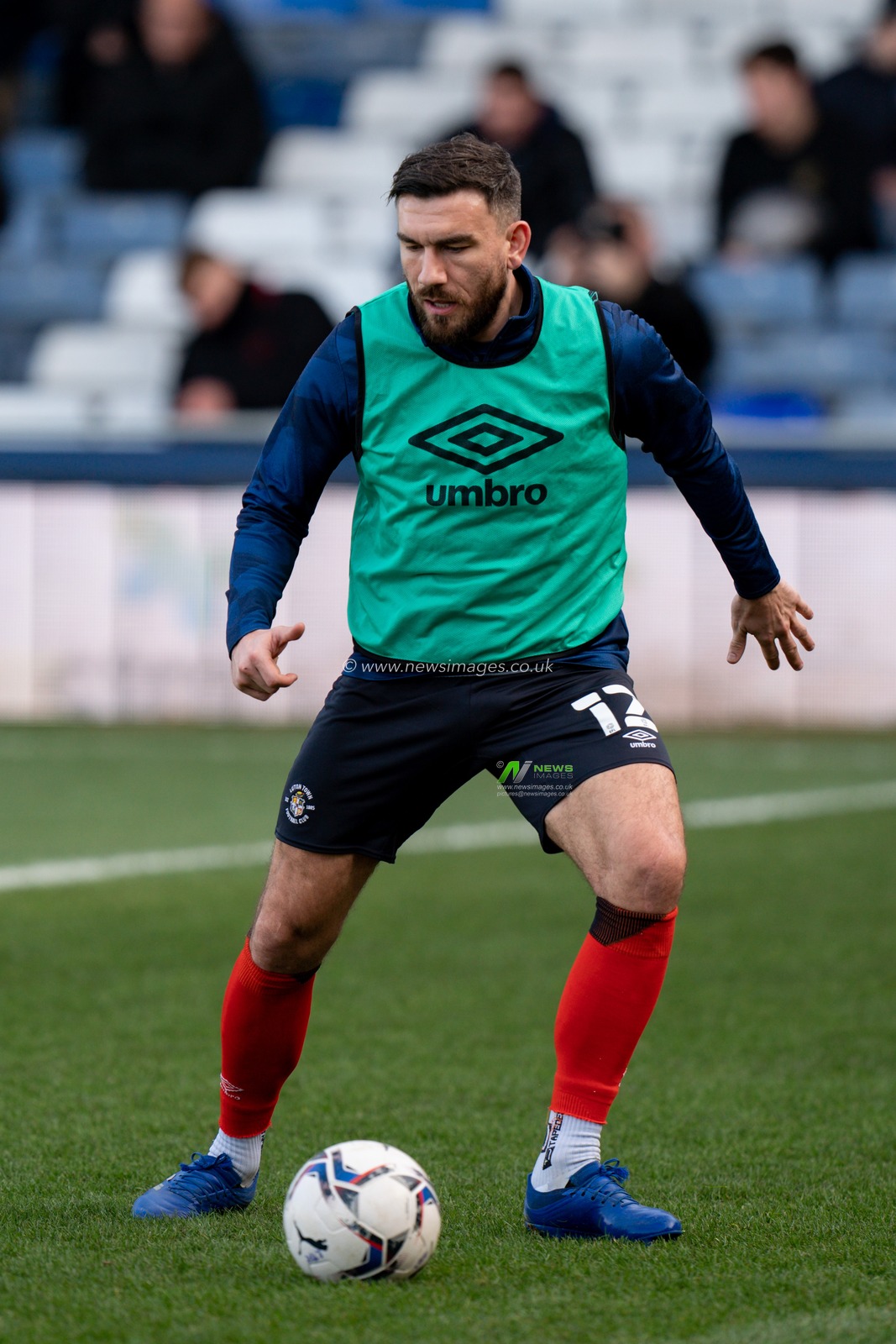 Robert Snodgrass #12 of Luton Town warming up