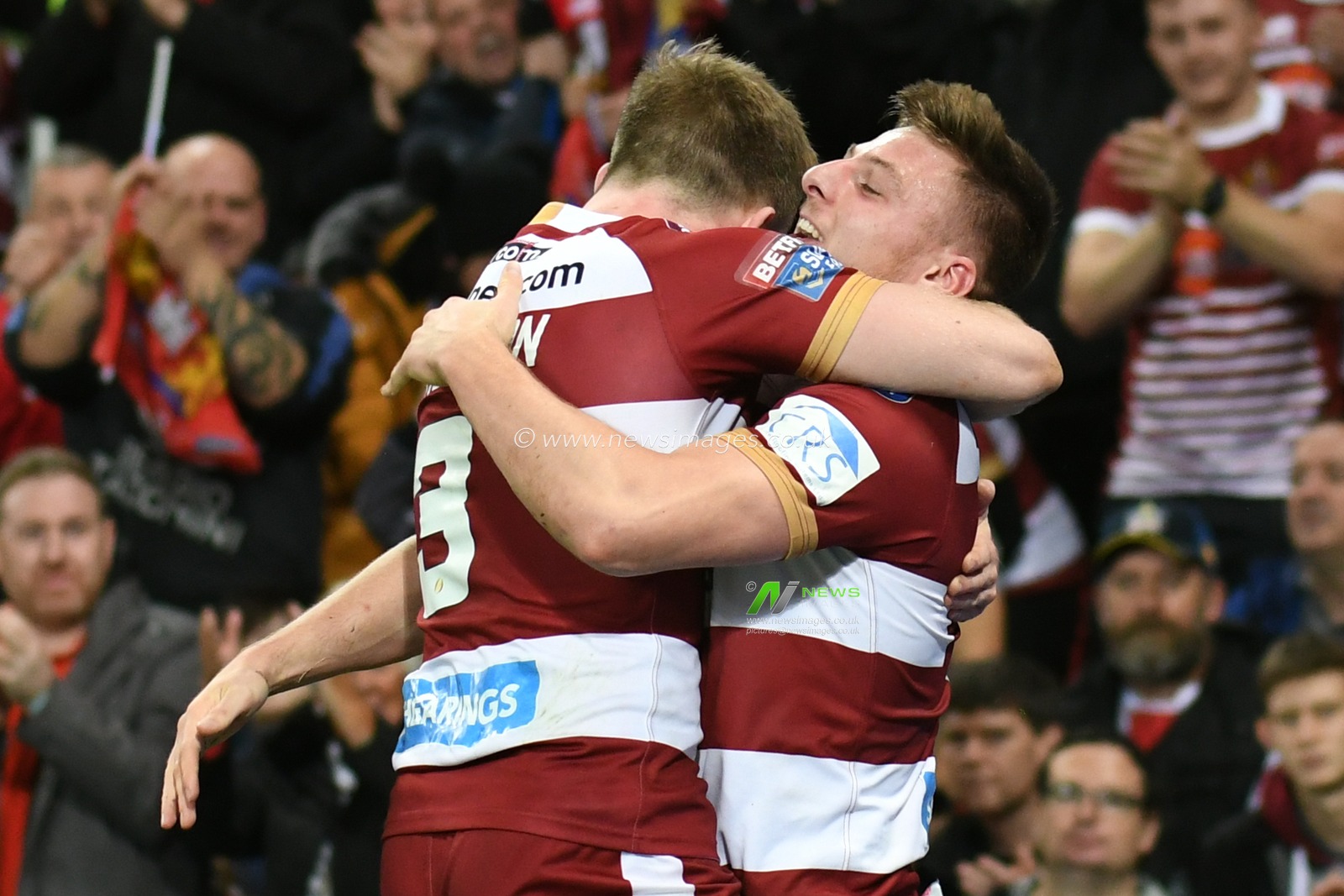 13th October 2018 , Old Trafford,  Manchester, England;  Betfred Super League Grand Final, Wigan Warriors v Warrington Wolves; Tom Davies of Wigan Warriors celebrates scoring their 2nd try with Dan Sarginson 


Credit: Richard Long/News Images