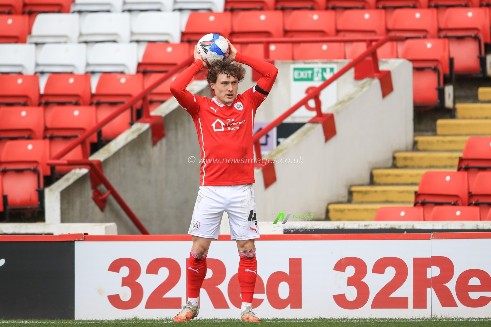 Callum Styles #4 of Barnsley takes a throw-in