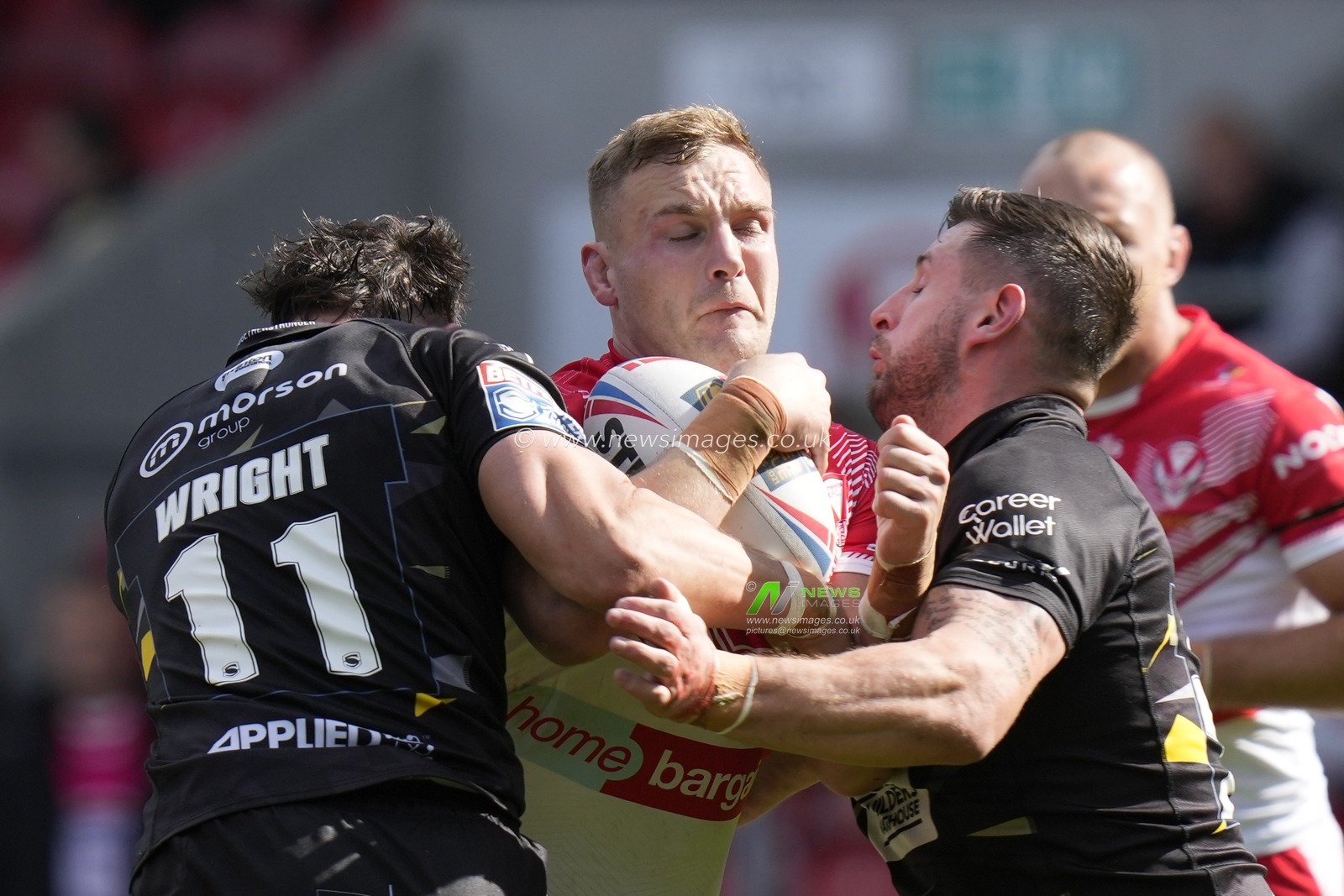 Matty Lees #10 of St Helens tackled by Shane Wright #11 of Salford Red Devils during the Betfred Super League match St Helens vs Salford Red Devils at Totally Wicked Stadium, St Helens, United Kingdom, 17th September 2022

(Photo by Steve Flynn/News Images)