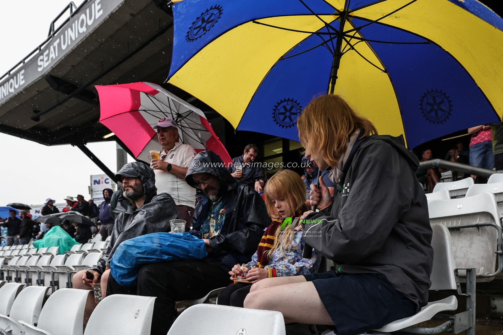 People try to keep dry under umbrellas as the rain continues to pour during the LV= Insurance Ashes Third Test Series Day 3 England v Australia at Headingley Stadium, Leeds, United Kingdom, 8th July 2023

(Photo by Mark Cosgrove/News Images)