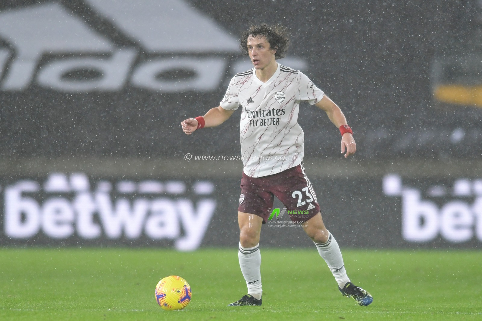 David Luiz #23 of Arsenal with the ball