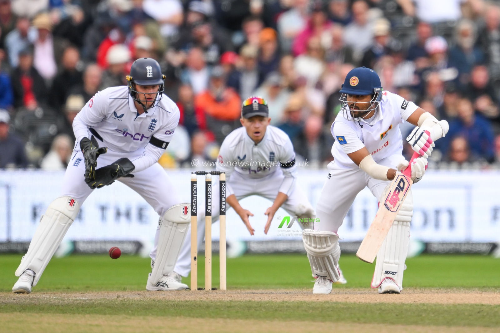 Dinesh Chandimal of Sri Lanka push the ball away during the England Men v Sri Lanka 1st Rothesay Test Match Day 4 at Old Trafford, Manchester, United Kingdom, 24th August 2024

(Photo by Craig Thomas/News Images)