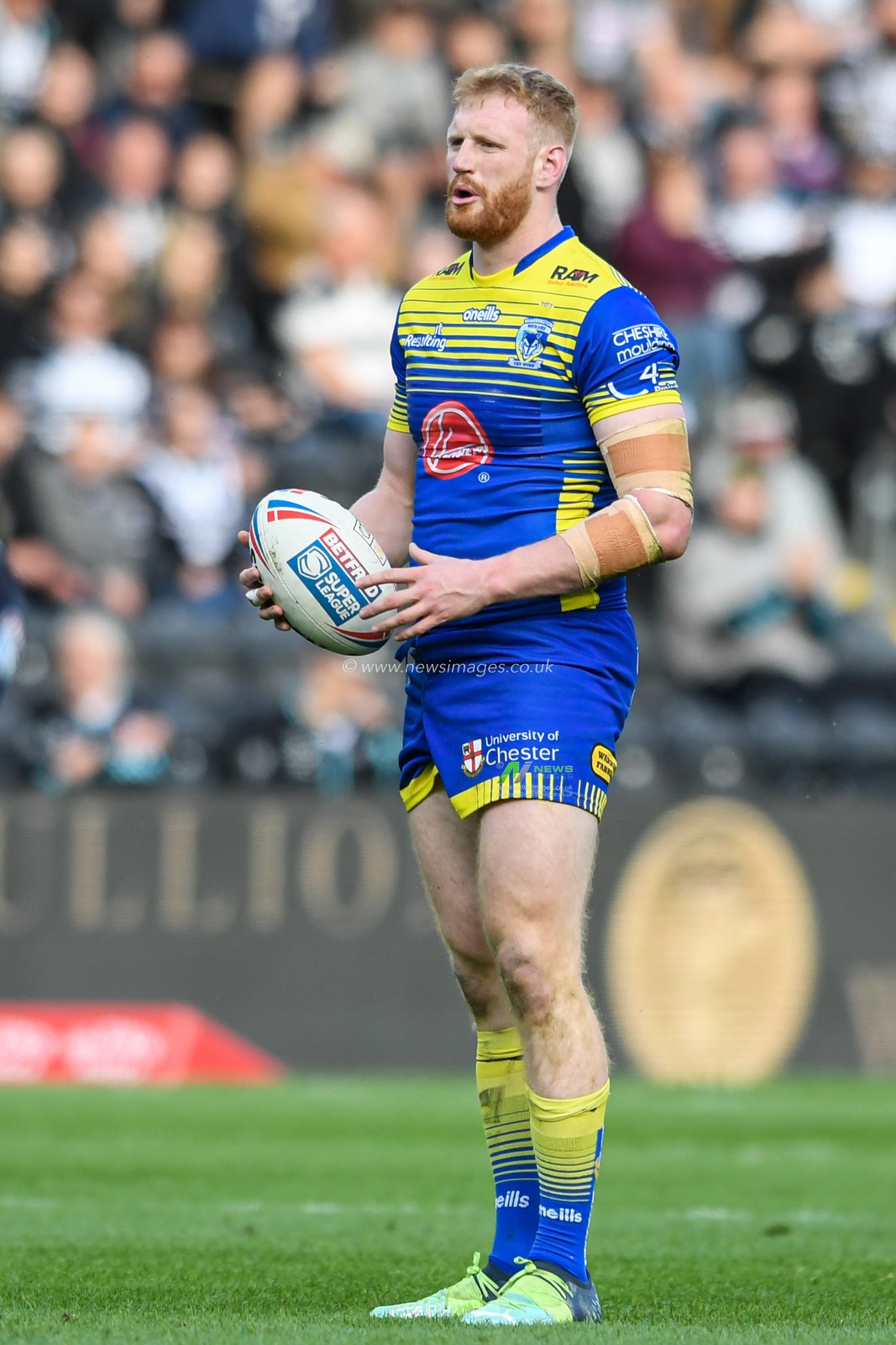 Joe Bullock #15 of Warrington Wolves with the ball