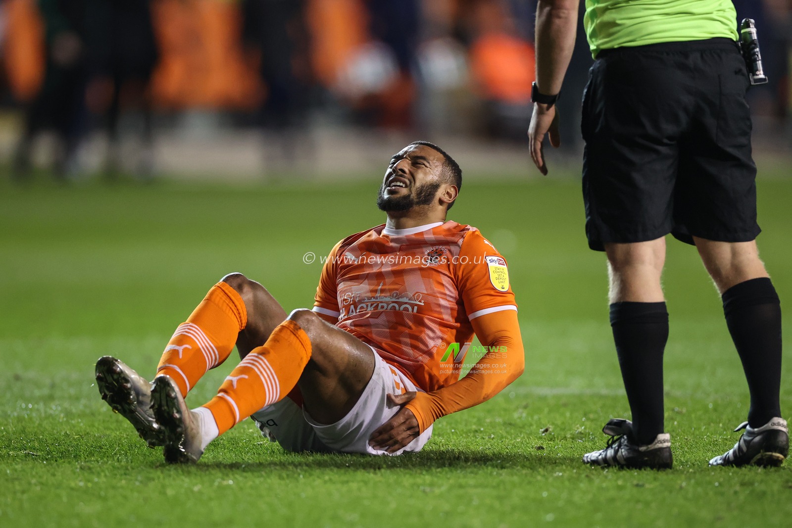 Keshi Anderson #10 of Blackpool lays injured