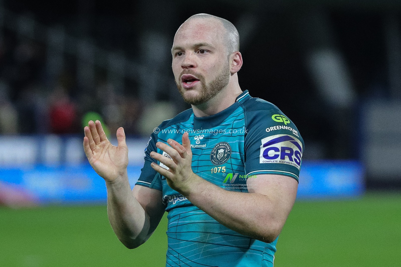 Liam Marshall #5 of Wigan Warriors claps his hands and applauds the supporters at full-time after the Betfred Super League Round 5 match Huddersfield Giants vs Wigan Warriors at John Smith's Stadium, Huddersfield, United Kingdom, 17th March 2023

(Photo by James Heaton/News Images)