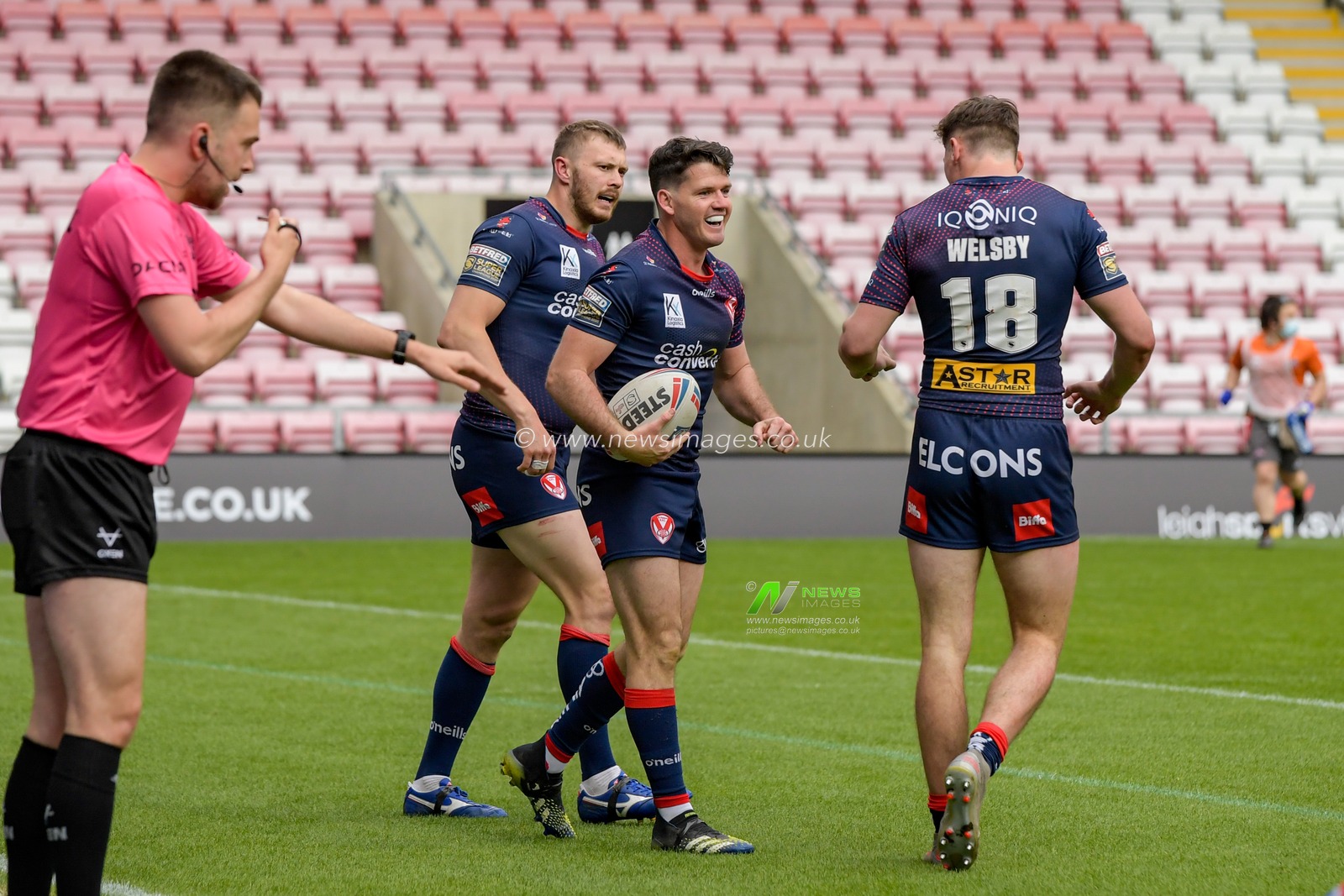 Lachlan Coote (1) of St Helens celebrates scoring a try to make it 6-10
