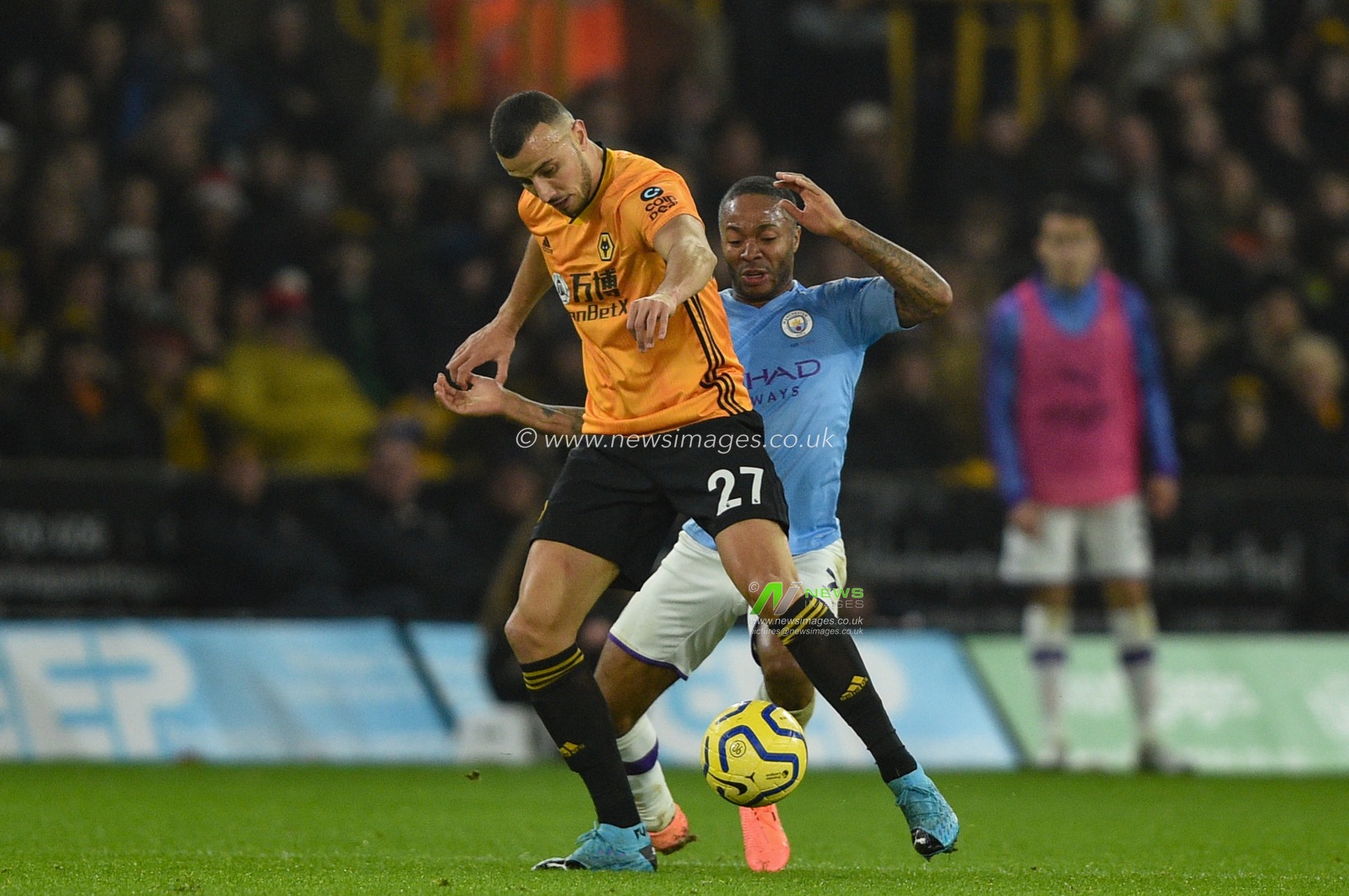27th December 2019, Molineux, Wolverhampton, England; Premier League, Wolverhampton Wanderers v Manchester City : Romain Saiss (27) of Wolverhampton Wanderers is fouled by Raheem Sterling (7) of Manchester City 

Credit: Richard Long/News Images