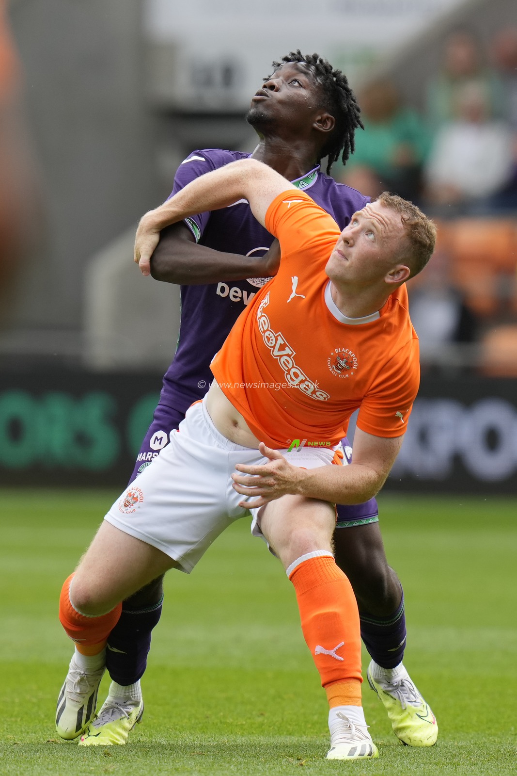 Kanayo Megwa #26 of Hibernian competes for a header with Shayne Lavery #19 of Blackpool during the Pre-season friendly match Blackpool vs Hibernian at Bloomfield Road, Blackpool, United Kingdom, 29th July 2023

(Photo by Steve Flynn/News Images)
