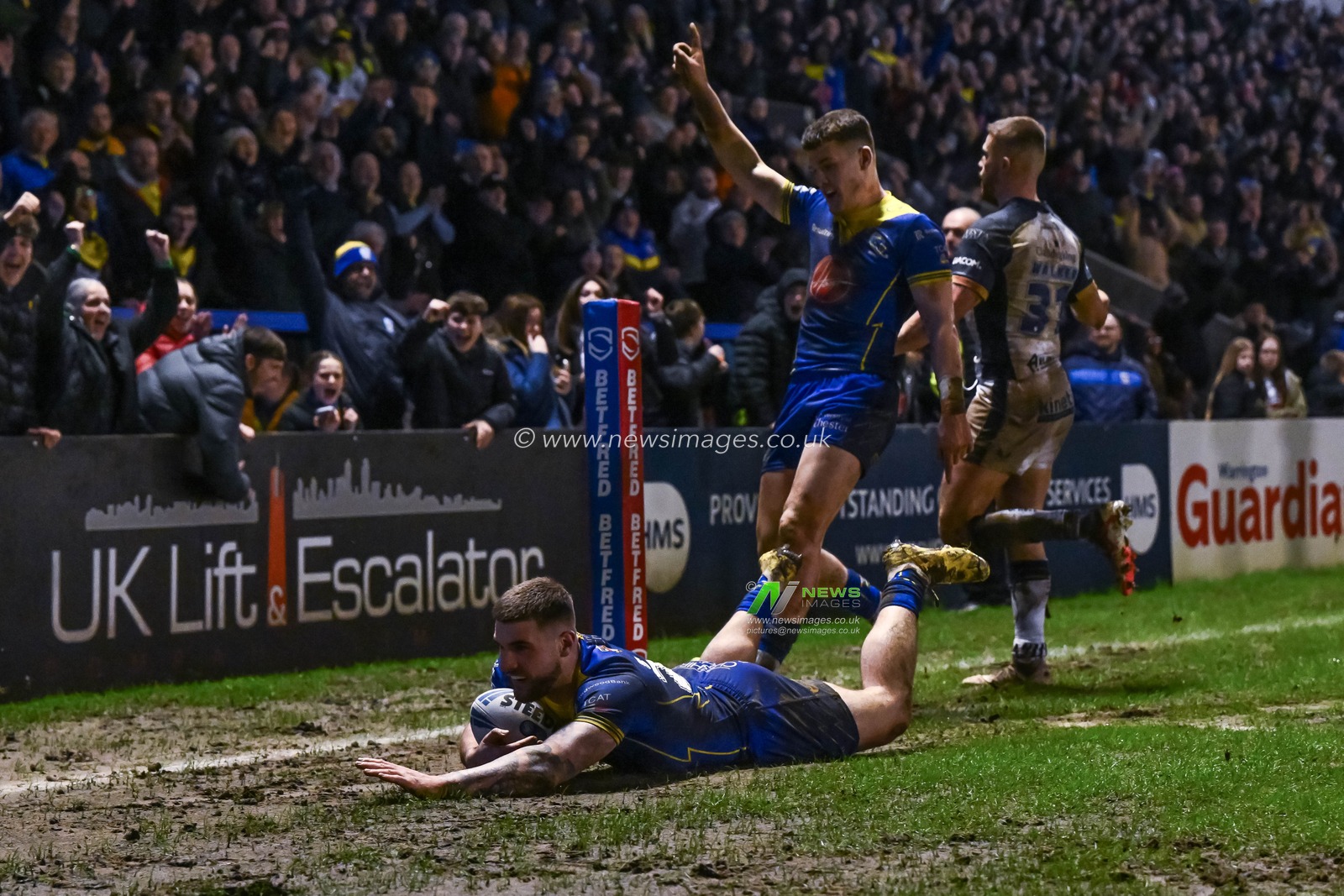 Connor Wrench of Warrington Wolves goes over for a try during the Betfred Super League Round 2 match Warrington Wolves vs Hull FC at Halliwell Jones Stadium, Warrington, United Kingdom, 23rd February 2024

(Photo by Craig Thomas/News Images)