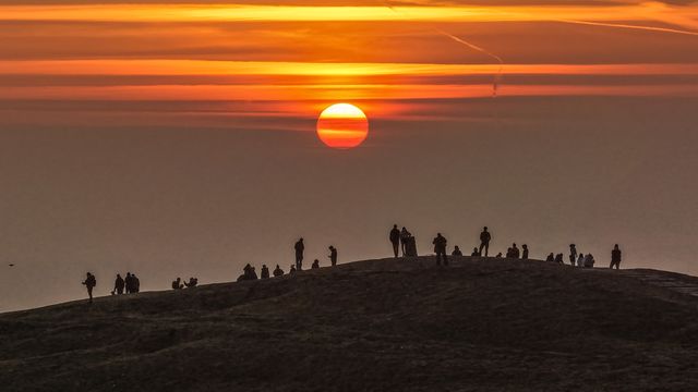 Sunrise hikers walk to the summit of Mam Tor as they watch the sunrise and admire the cloud inversion in the Hope Valley at Mam Tor in the Peak District at Mam Tor, Castleton, United Kingdom on 21 March 2026

(Photo by Mark Cosgrove/News Images)