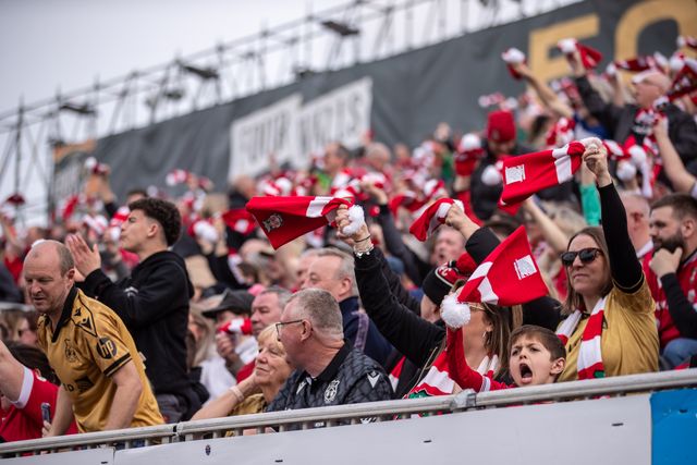 Wrexham fans during the Sky Bet League 1 match Wrexham vs Stockport County at SToK Cae Ras, Wrexham, United Kingdom, 22nd March 2025

(Photo by Nik Mesney/News Images)