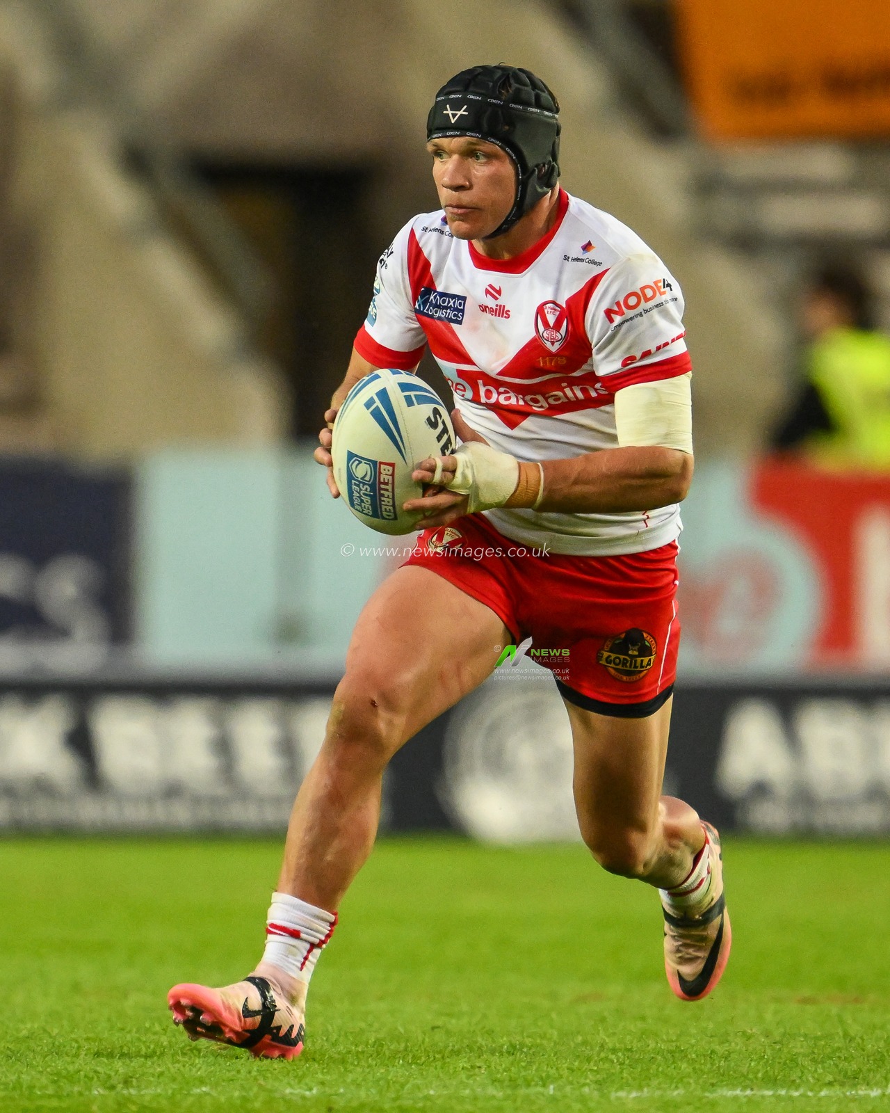 Jonny Lomax of St. Helens makes a break during the Betfred Super League Round 16 match St Helens vs Castleford Tigers at Totally Wicked Stadium, St Helens, United Kingdom, 5th July 2024

(Photo by Craig Thomas/News Images)