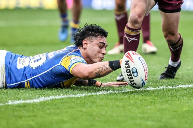 Keenan Palasia of Leeds Rhinos reaches for a try however he drops the ball during the Betfred Super League Round 8 match Leeds Rhinos vs Huddersfield Giants at Headingley Stadium, Leeds, United Kingdom, 18th April 2025

(Photo by Alfie Cosgrove/News Images)