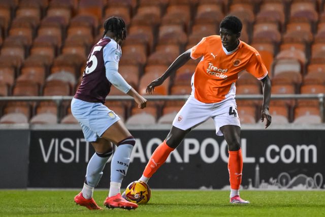 Terry Bondo of Blackpool makes a break with the ball during the Vertu Trophy match Blackpool vs Aston Villa U21 at Bloomfield Road, Blackpool, United Kingdom, 17th December 2024

(Photo by Craig Thomas/News Images)