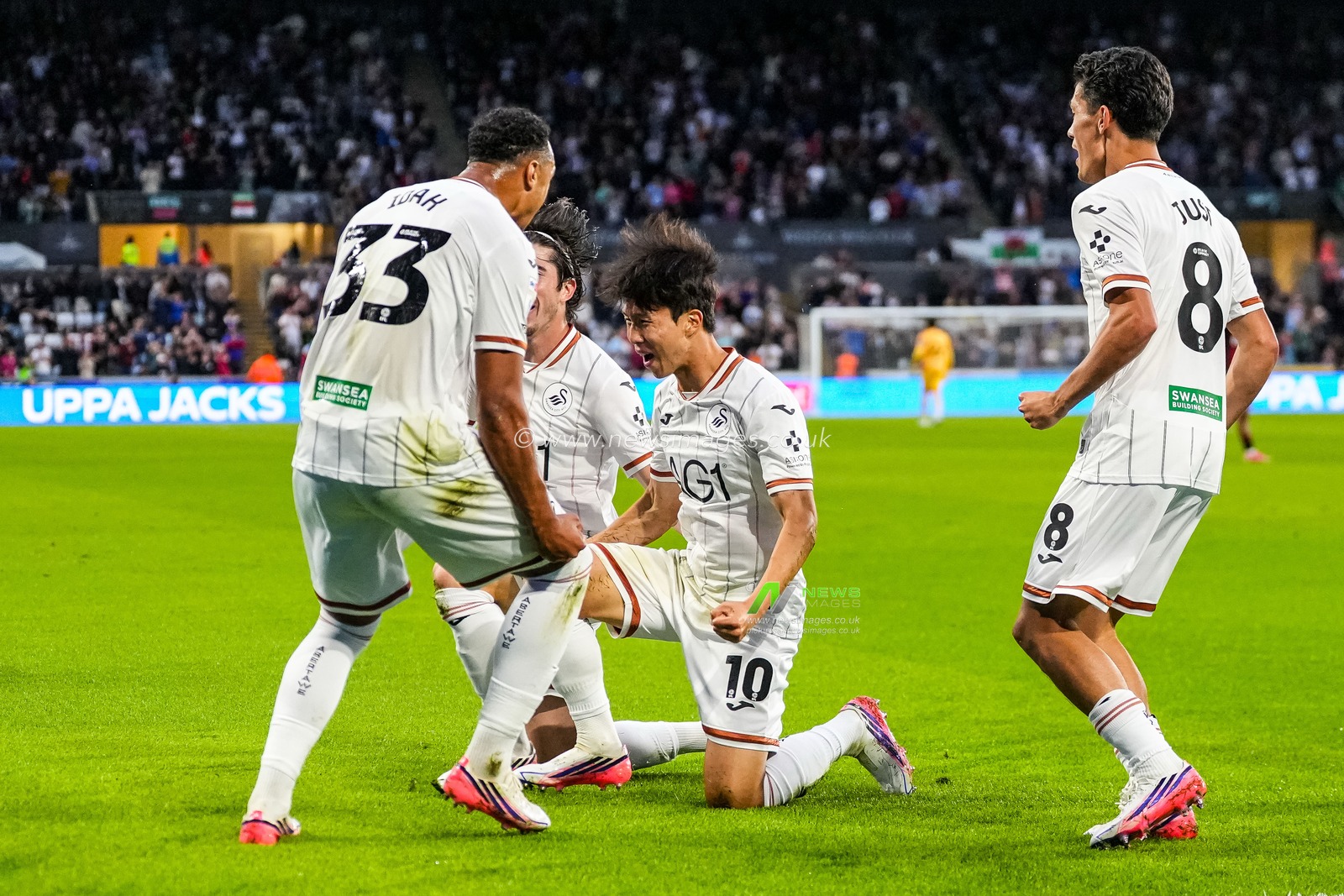 Eom Ji-Sung of Swansea City celebrates scoring his teams first goal during the Sky Bet Championship match Swansea City vs Watford at Swansea.com Stadium, Swansea, United Kingdom on 01 September 2026

(Photo by Andrew Lewis/News Images)
