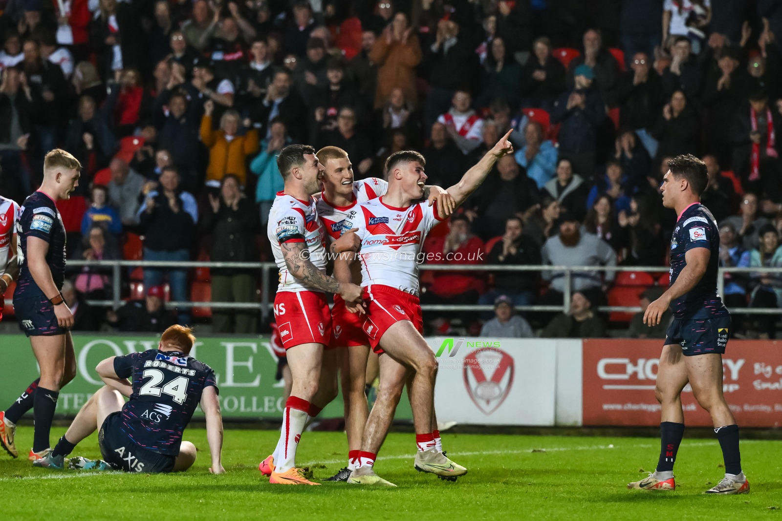 Jack Welsby of St. Helens celebrates his try during the Betfred Super League Round 12 match St Helens vs Leeds Rhinos at Totally Wicked Stadium, St Helens, United Kingdom, 24th May 2024

(Photo by Craig Thomas/News Images)