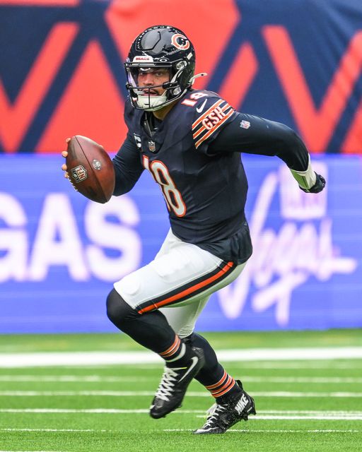 Caleb Williams of the Chicago Bears runs for a first done during the Week 6 match Chicago Bears vs Jacksonville Jaguars at Tottenham Hotspur Stadium, London, United Kingdom, 13th October 2024

(Photo by Craig Thomas/News Images)