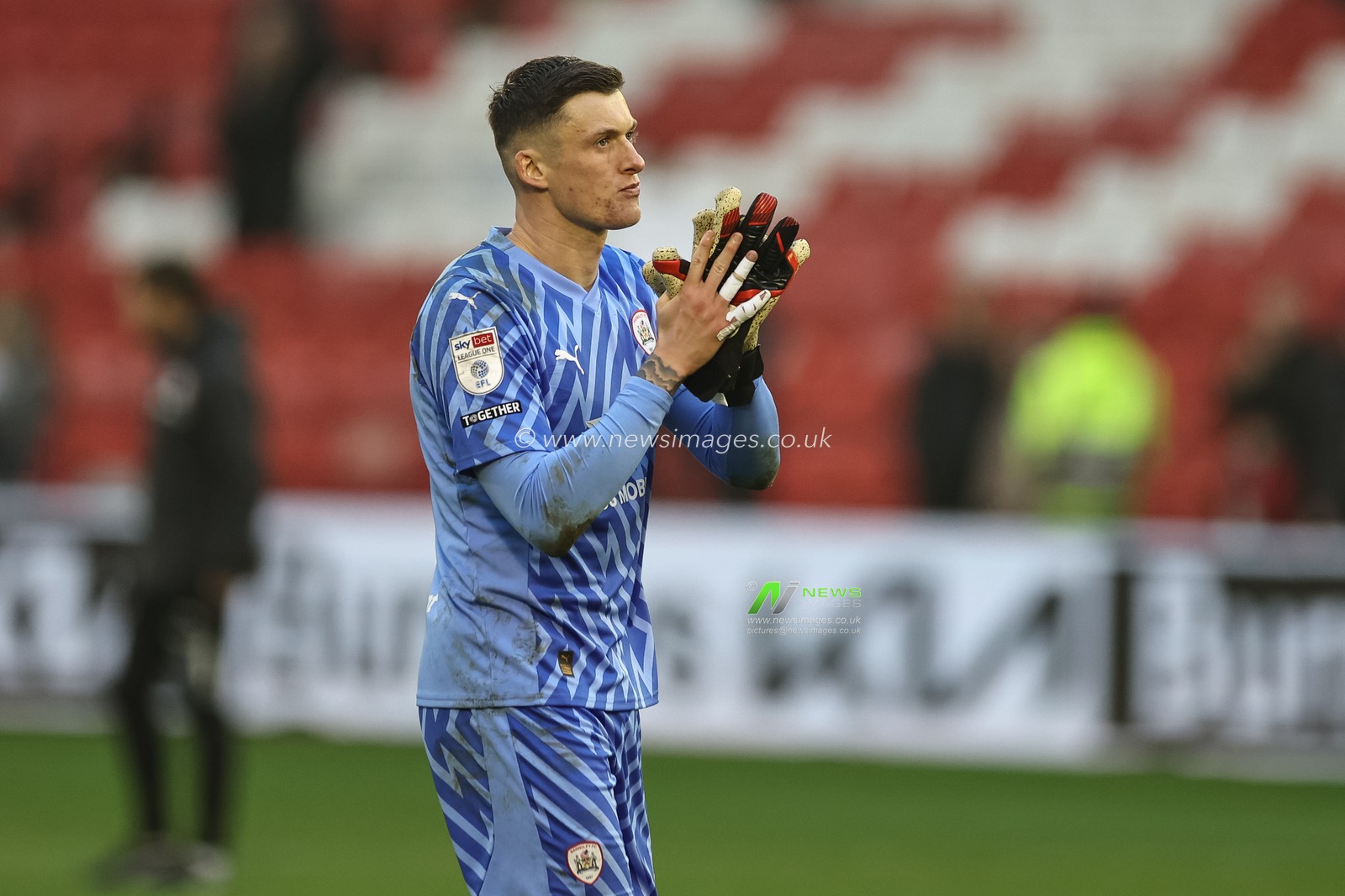 Liam Roberts of Barnsley applauds the home fans after losing 1-5 during the Sky Bet League 1 match Barnsley vs Lincoln City at Oakwell, Barnsley, United Kingdom, 9th March 2024

(Photo by Mark Cosgrove/News Images)