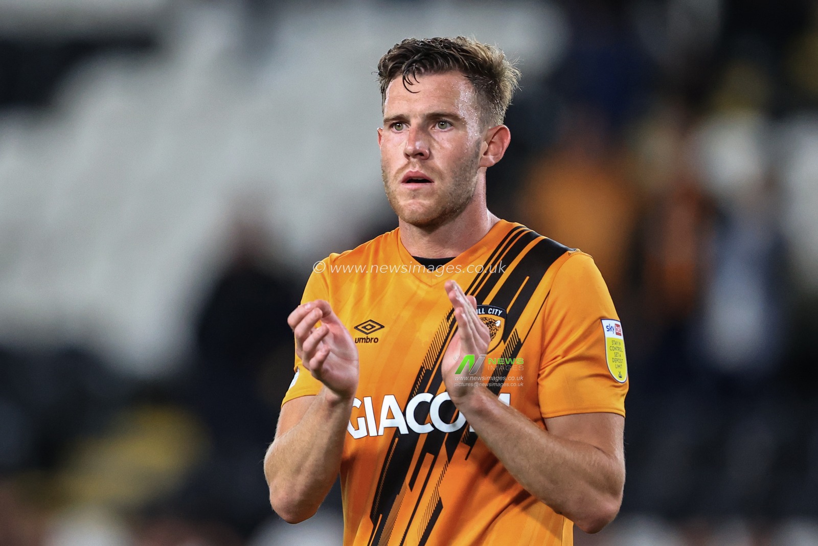 Callum Elder #3 of Hull City applauds the home fans after the final whistle