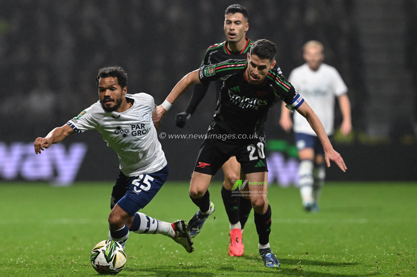 Duane Holmes of Preston North End holds off Jorginho of Arsenal during the Carabao Cup Last 16 match Preston North End vs Arsenal at Deepdale, Preston, United Kingdom, 30th October 2024

(Photo by Cody Froggatt/News Images)