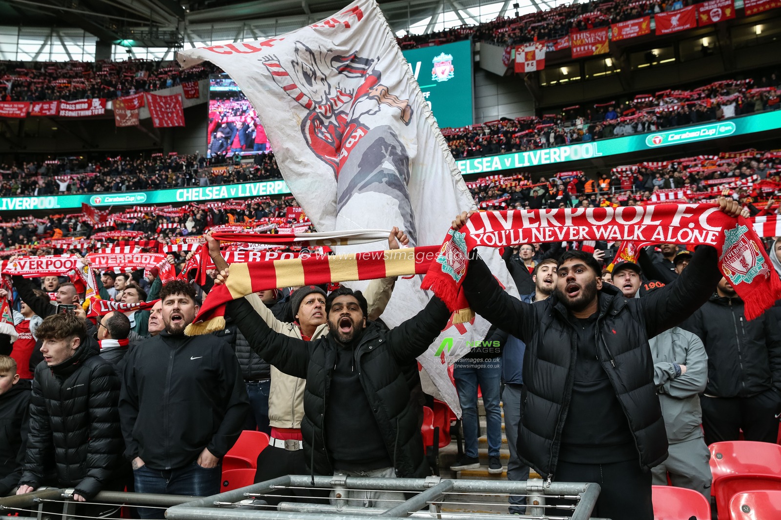 Liverpool fans sing You'll Never Walk Alone as they hold their scarfs above their heads during the Carabao Cup Final match Chelsea vs Liverpool at Wembley Stadium, London, United Kingdom, 25th February 2024

(Photo by Gareth Evans/News Images)