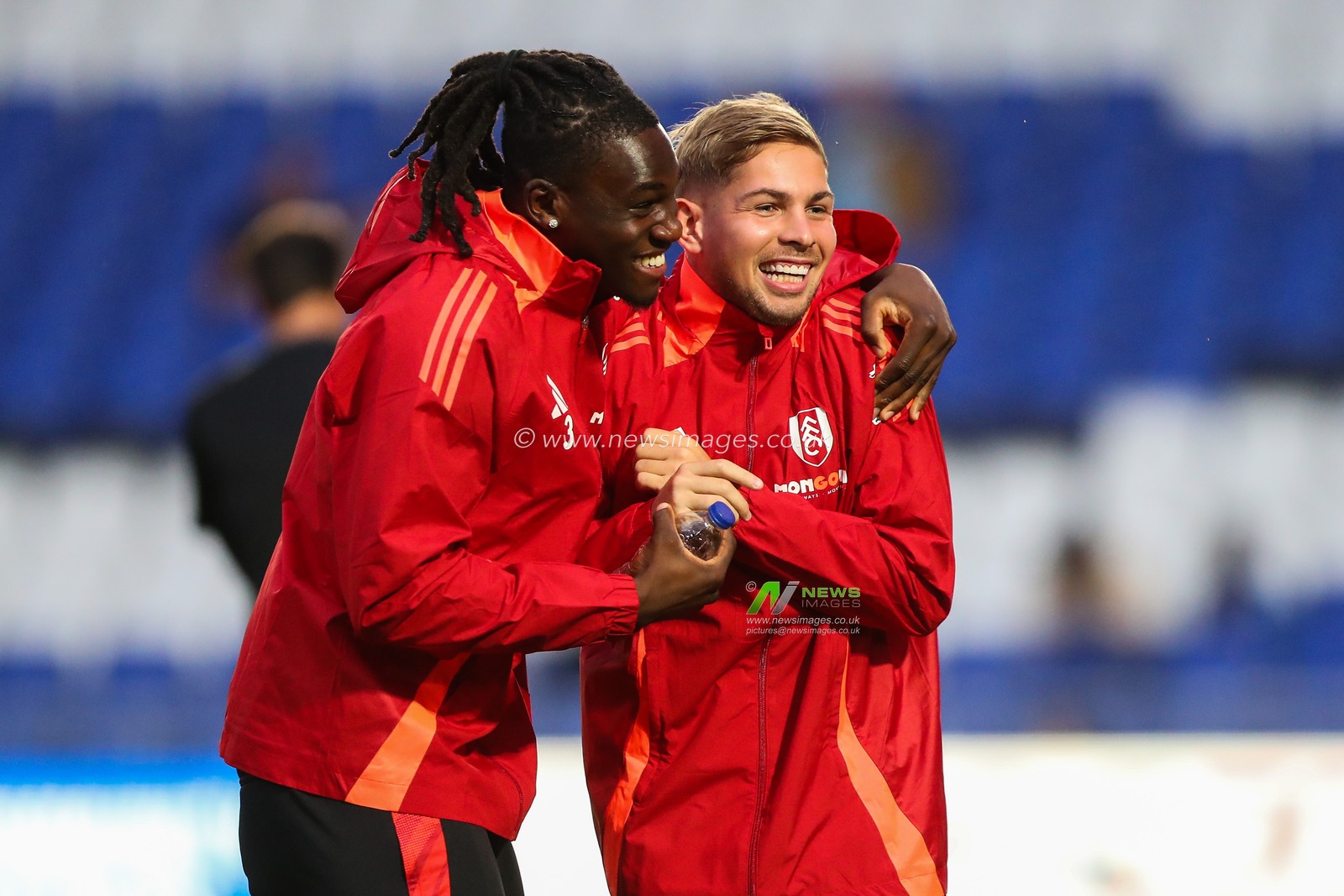 Calvin Bassey of Fulham and Emile Smith Rowe of Fulham share a joke during the pre-game warm up ahead of the Carabao Cup match Birmingham City vs Fulham at St Andrews, Birmingham, United Kingdom, 27th August 2024

(Photo by Gareth Evans/News Images)