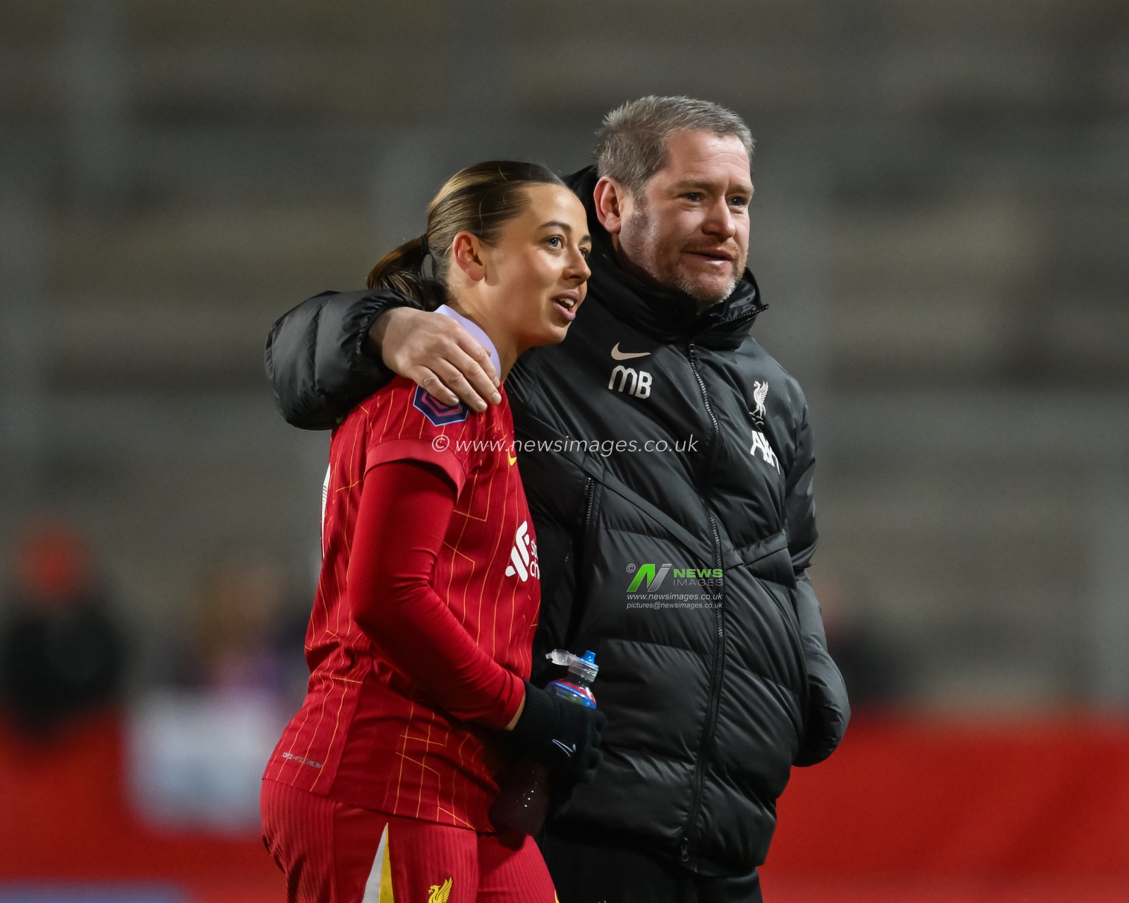 Matt Beard Manager of Liverpool and Cornelia Kapocs of Liverpool celebrate at the end of of the Women's League Cup - Group Stage - Group A Liverpool Women v Everton Women at St Helens Stadium, St Helens, United Kingdom, 11th December 2024

(Photo by Craig Thomas/News Images)